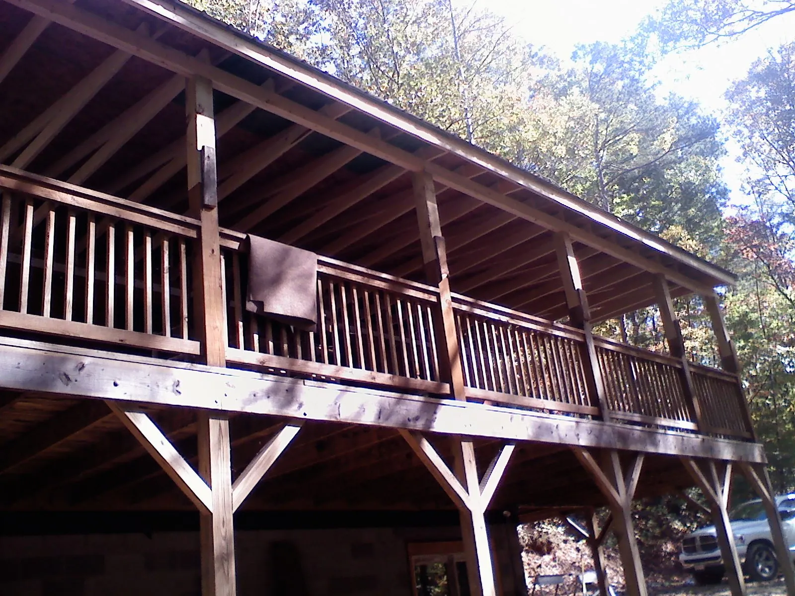 Timber framing under a new elevated porch and deck — Roof Leak Repair in Cleburne by Roofing Brothers